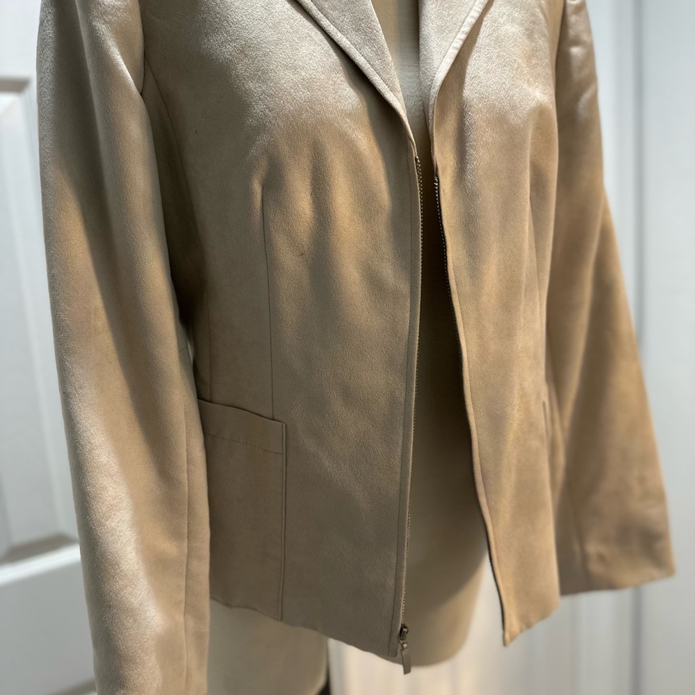 Cream color, suede jacket with 
Zipper instead of buttons